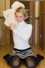 Isa on the floor with teddy